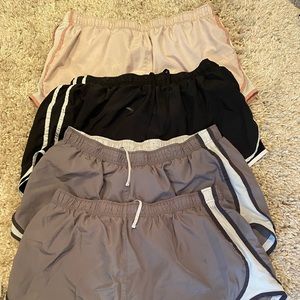 4 pairs of Nike shorts. Size 1X